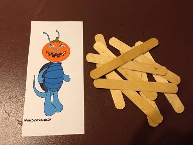 Puzzle avec un monstre citrouille caboucadin puzzle citrouille halloween avec batonnets en bois 1